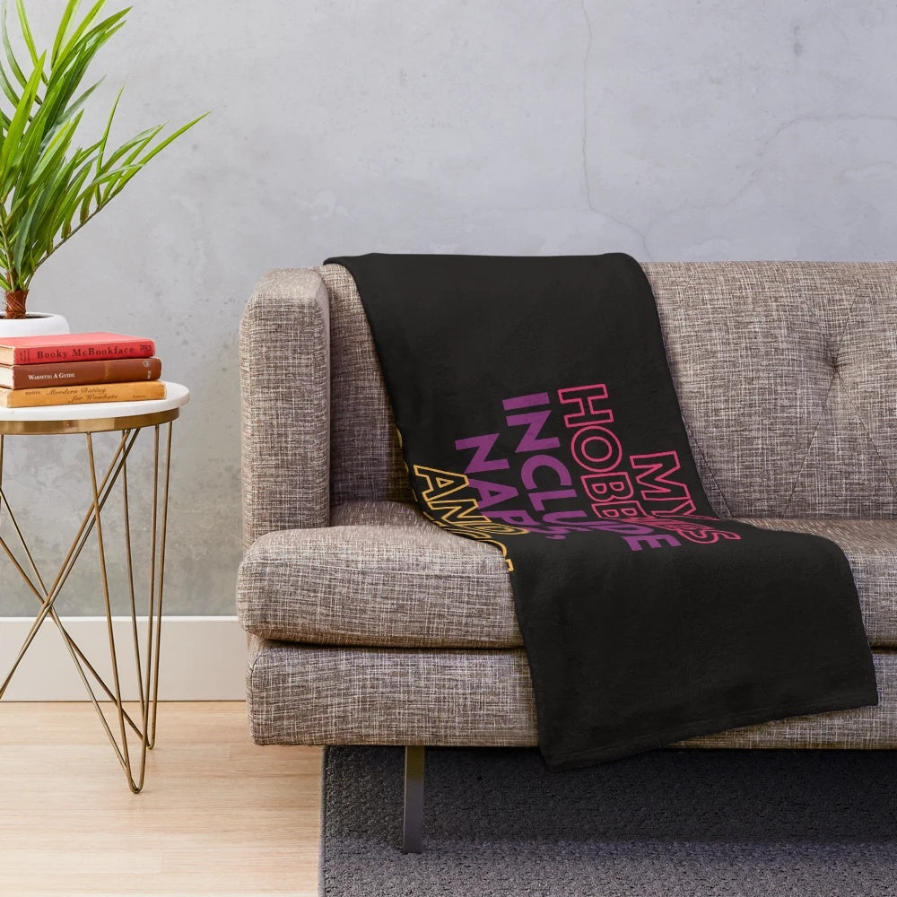Cozy plush blanket featuring hobbies of naps and comics