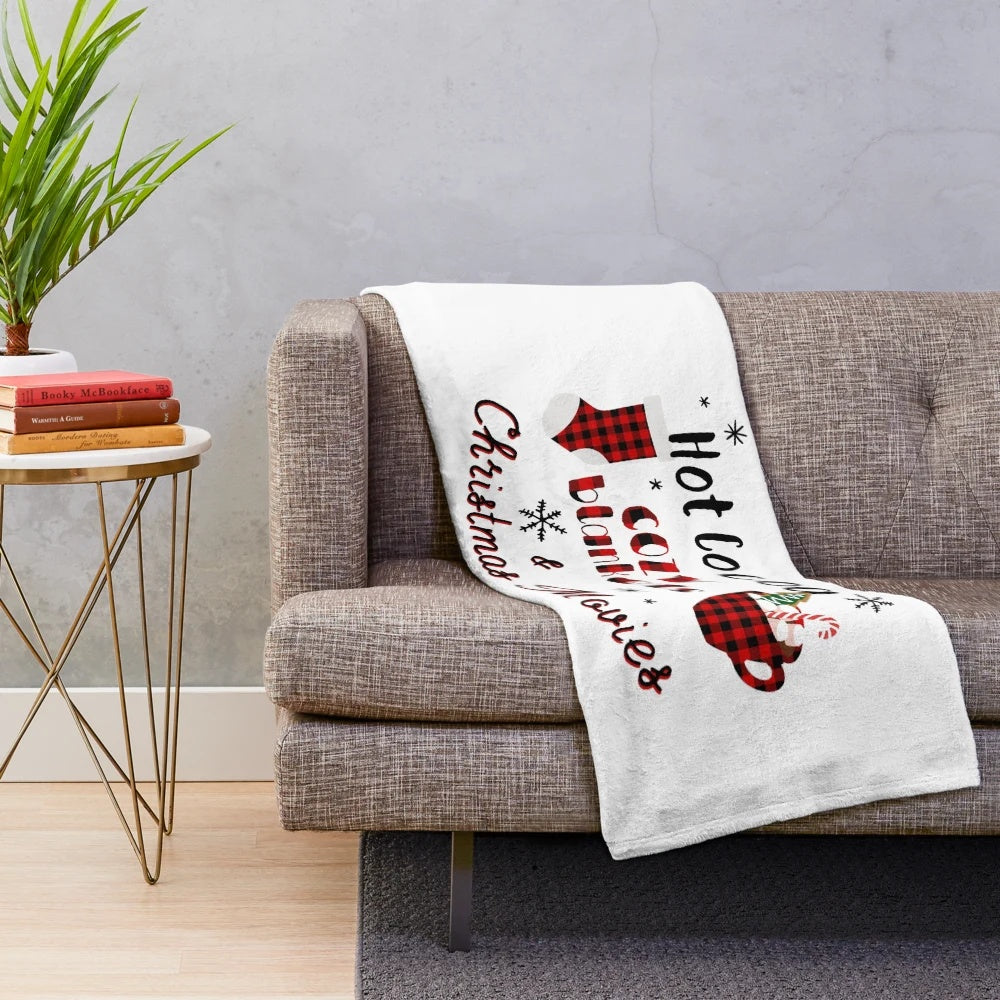 Soft and plush holiday-themed blanket for snuggling up during Christmas movies