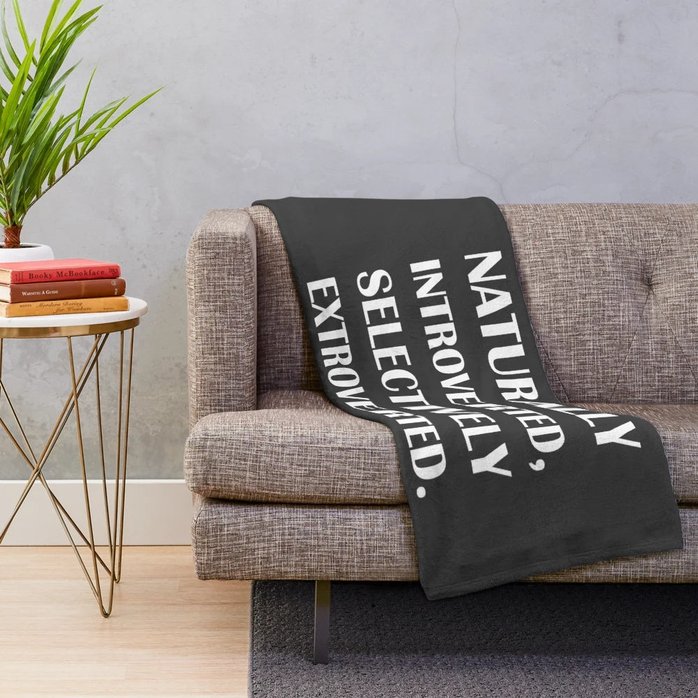 Introvert-themed plush blanket with cozy and reflective design