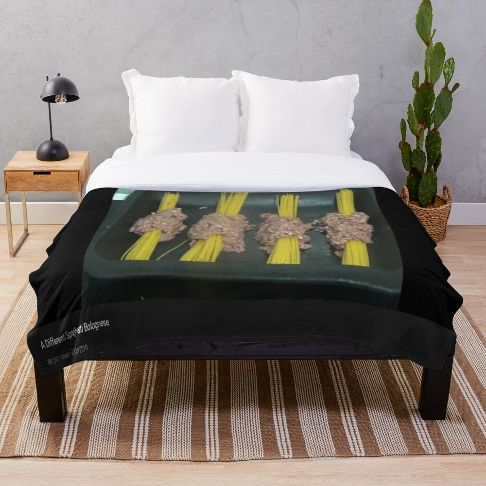 Plush blanket featuring a spaghetti bolognese design inspired by Kay's Cooking