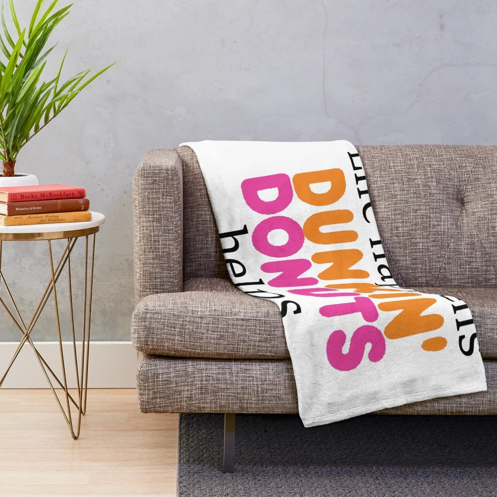 Soft and cuddly plush blanket featuring a Dunkin' Donuts inspired design