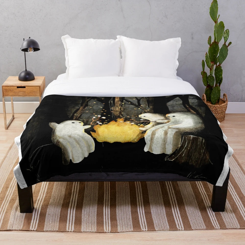 Plush blanket with marshmallows and ghost stories design