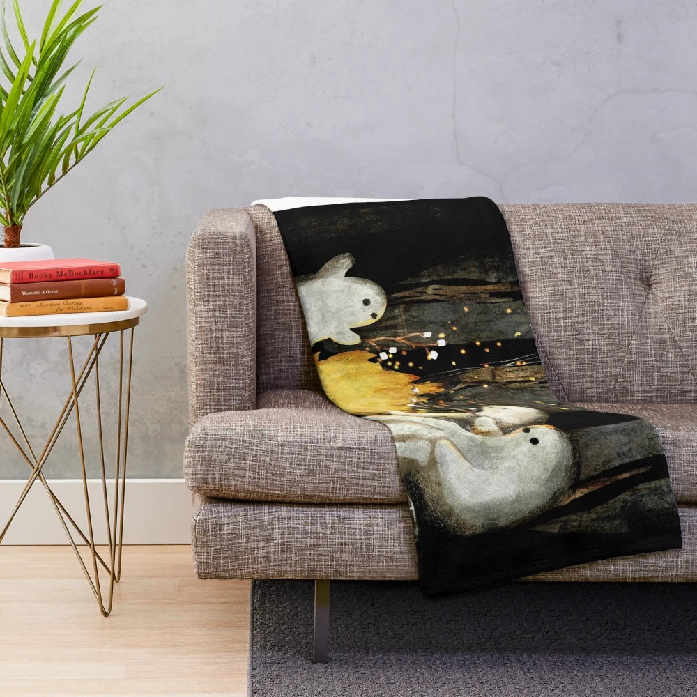 Plush blanket with marshmallows and ghost stories design