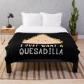 Plush blanket with a funny "I Just Want a Quesadilla" design, perfect for Mexican food lovers