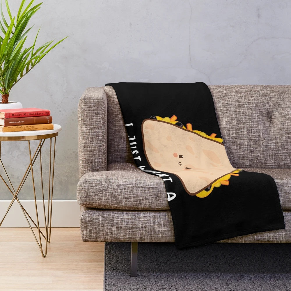 Plush blanket with a funny "I Just Want a Quesadilla" design, perfect for Mexican food lovers
