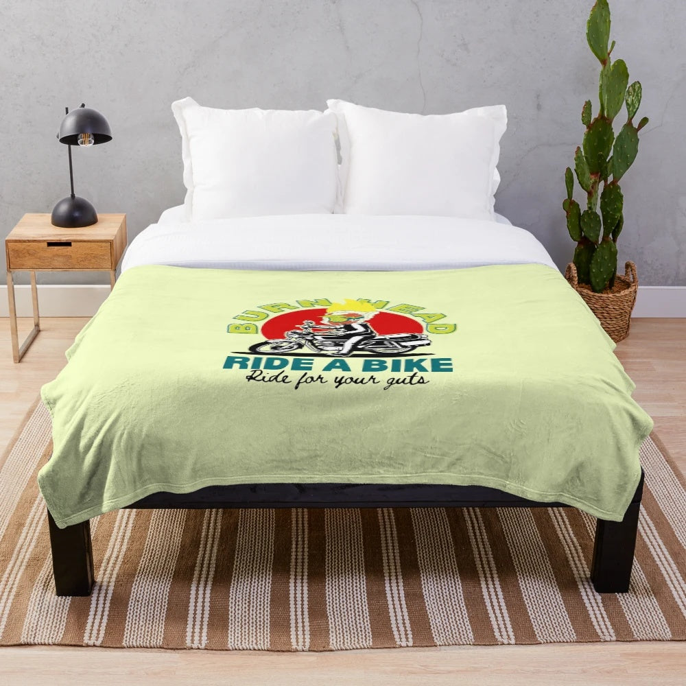 Plush blanket featuring a bold and stylish burn head design for motorcycle and scooter fans