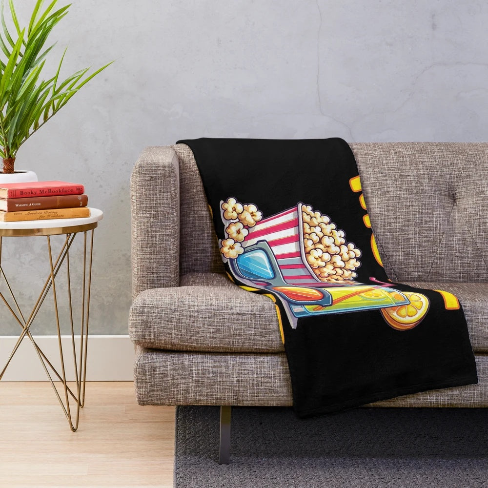 Plush blanket with movie night, popcorn, and lemonade design