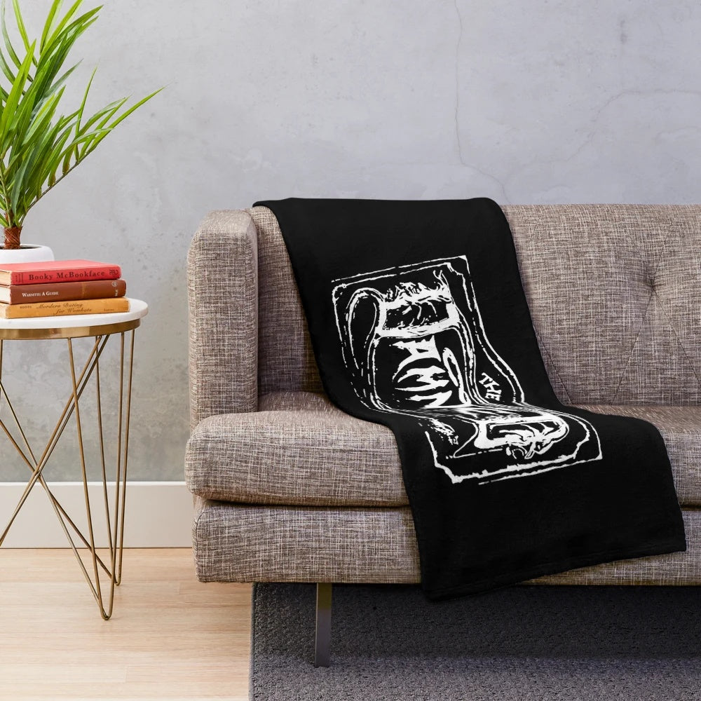 Plush blanket featuring the "The Damned" band logo and design
