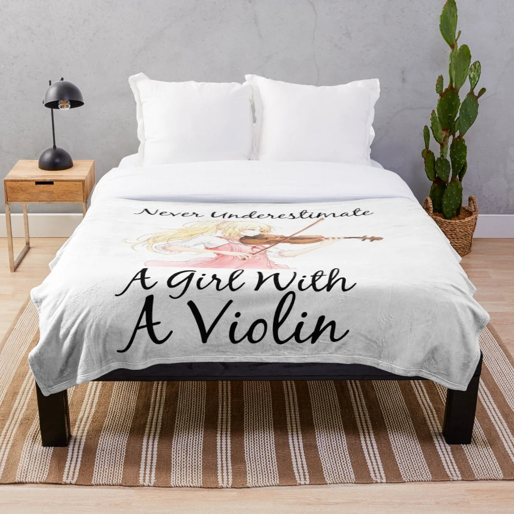 Plush blanket with a violin graphic design for music lovers
