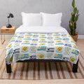 Plush blanket with napping and sleep-themed graphic