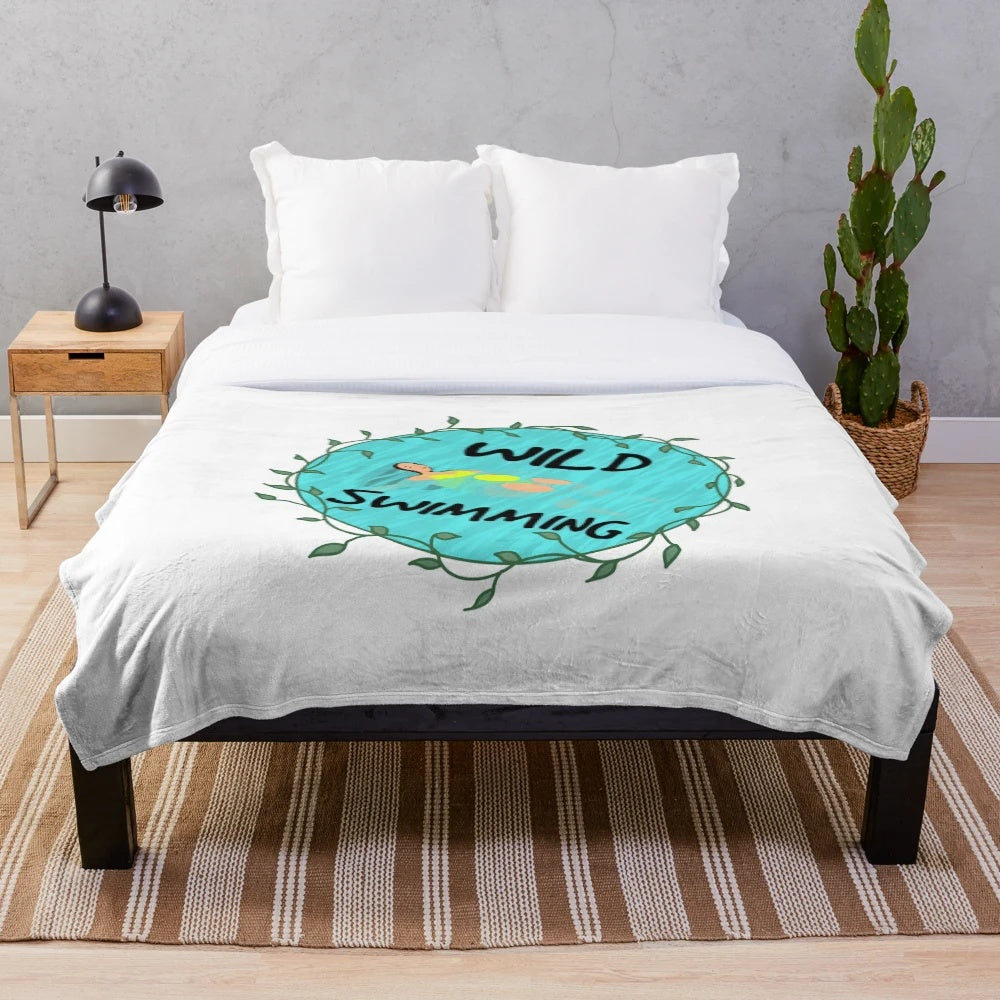 Plush blanket with a wild swimming design
