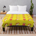 Plush blanket with a nuggets and fries design