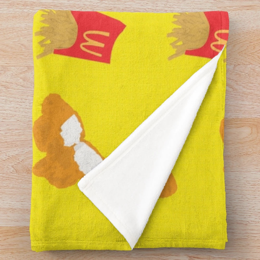 Plush blanket with a nuggets and fries design