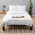 Plush hiking blanket with colorful, vintage-inspired design