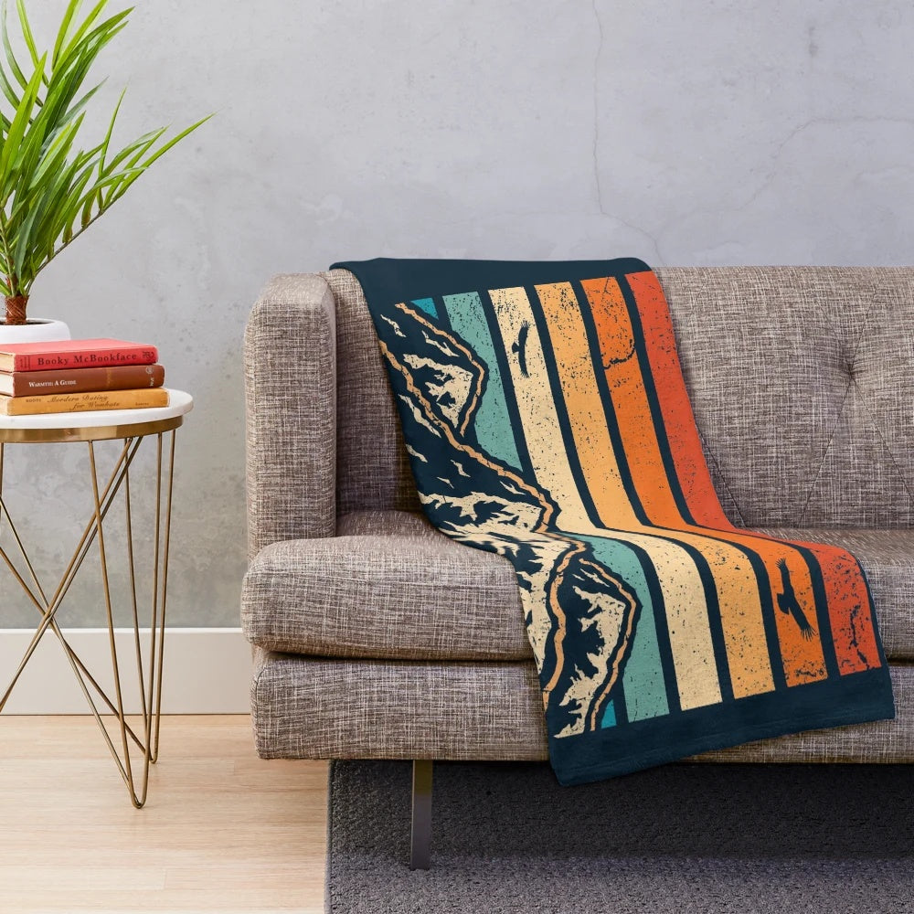 Plush blanket featuring a retro mountain design