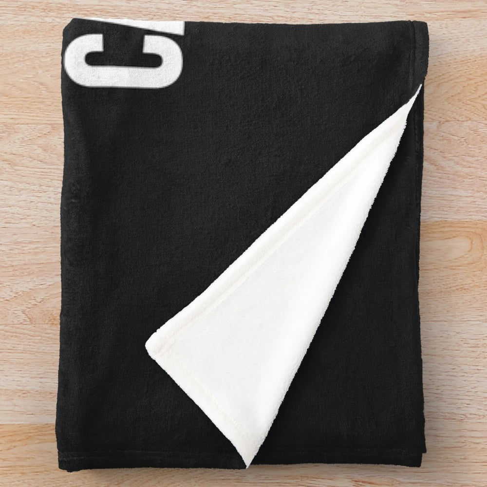 Plush blanket for overworked and under-caffeinated professionals