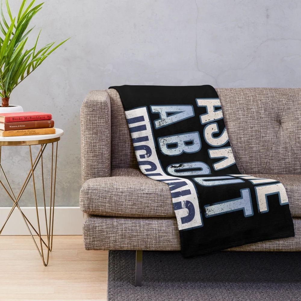 Plush blanket with a juggling design and text