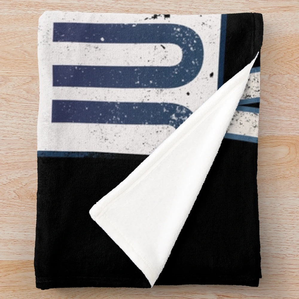 Plush blanket with a juggling design and text