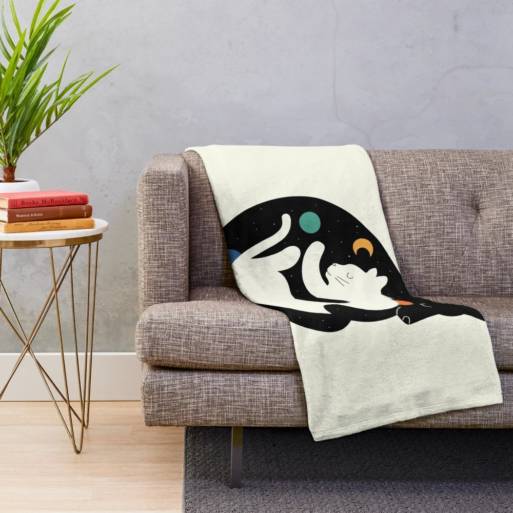 Plush blanket with "More Hugs Less Fights" design