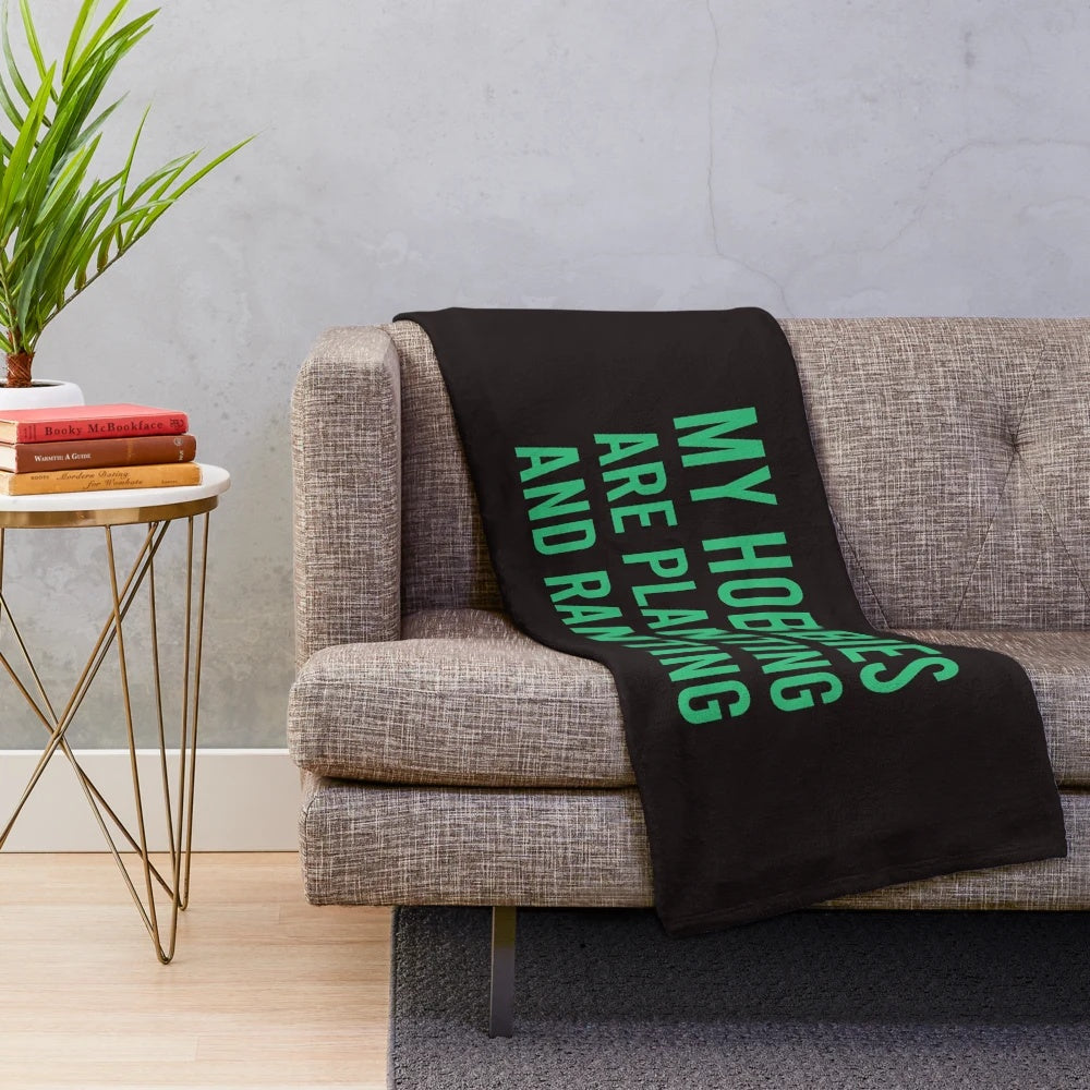 Plush blanket with "My Hobbies Are Planting And Ranting" design