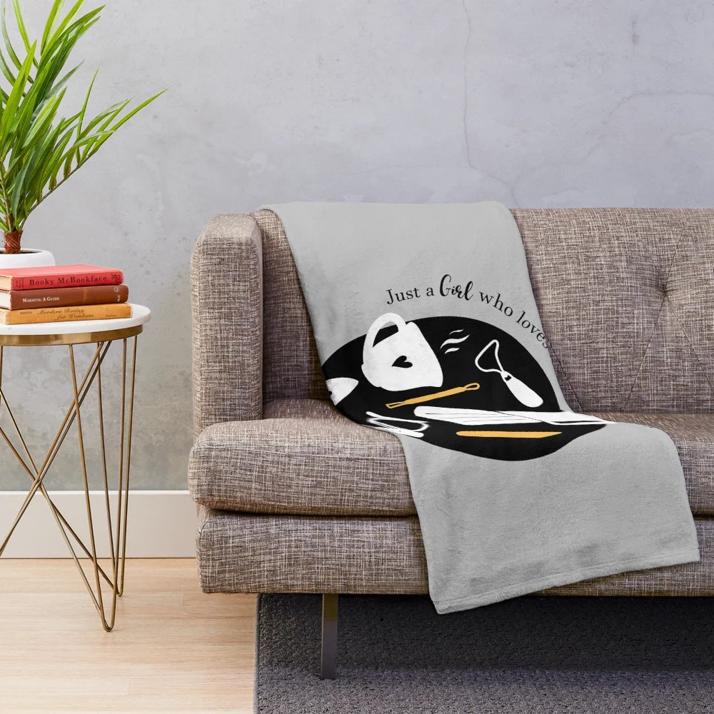 Plush blanket with a design featuring a girl who loves pottery and coffee