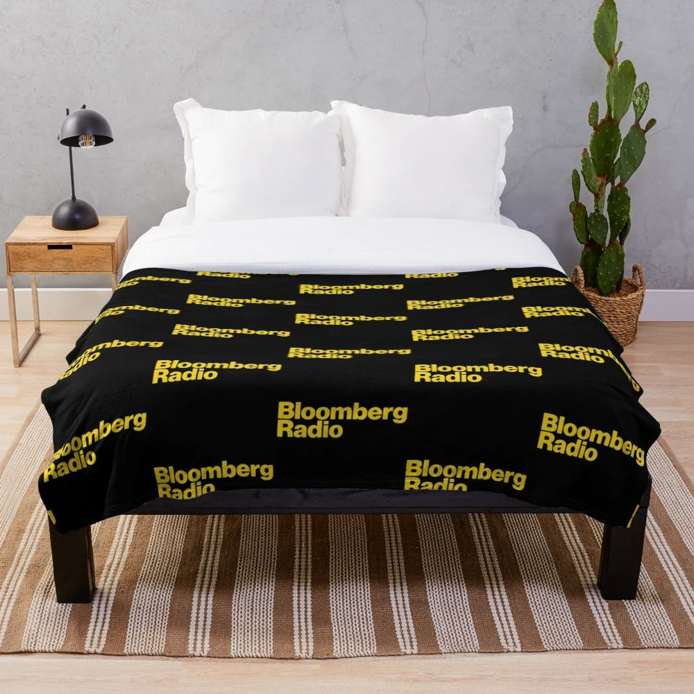 Plush blanket for radio listeners with NPR, news, sports, and music designs