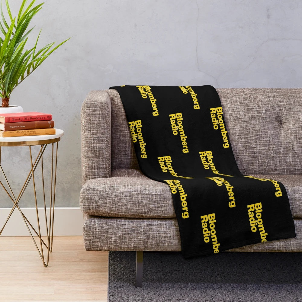 Plush blanket for radio listeners with NPR, news, sports, and music designs