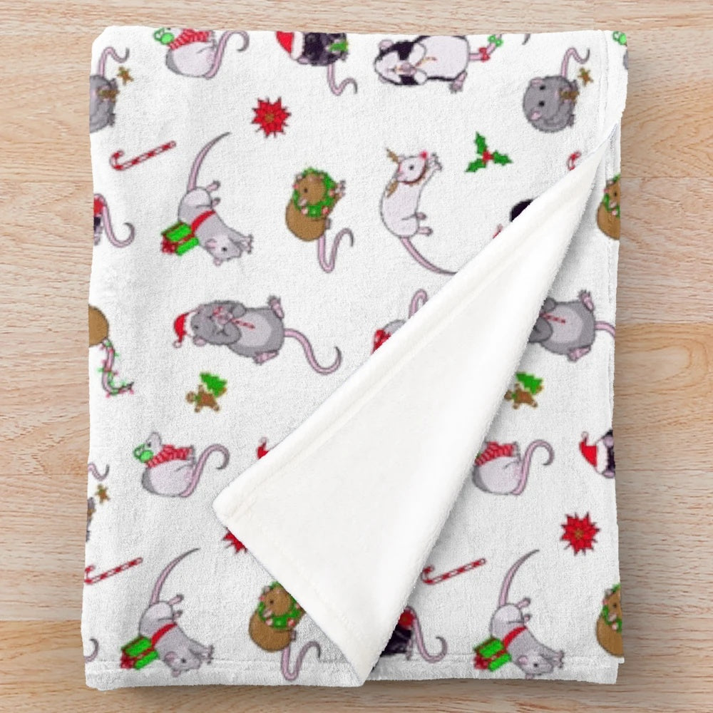 Soft and snuggly plush blanket featuring cute dumbo rats in a festive Christmas design.
