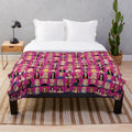 Soft and cozy plush blanket featuring the Real Housewives logo