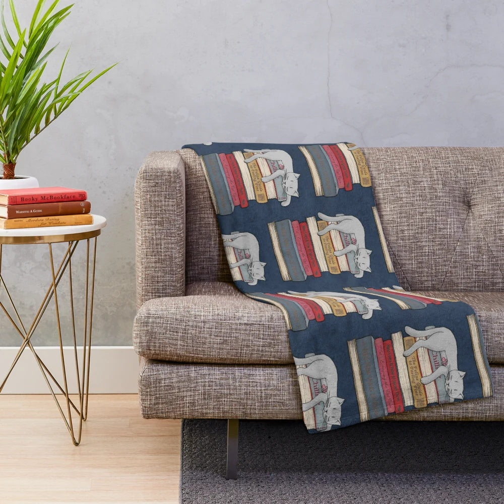 Plush blanket with cat nap design