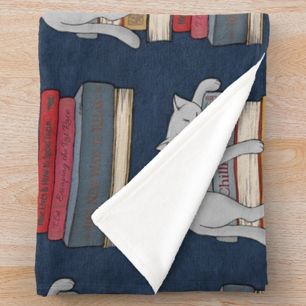 Plush blanket with cat nap design