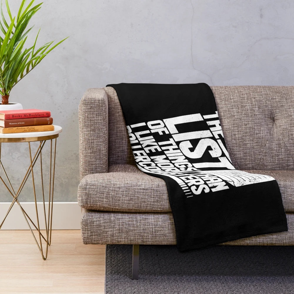 Plush blanket with a funny list of things the owner likes more than roller coasters
