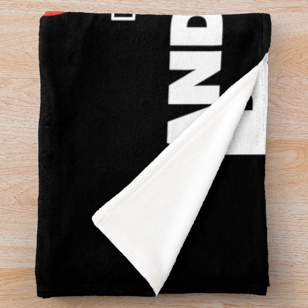 A plush, cozy blanket featuring a funny rugby-themed quote