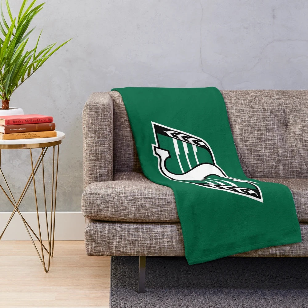 Plush blanket featuring Saskatchewan team colors and logo design for fans