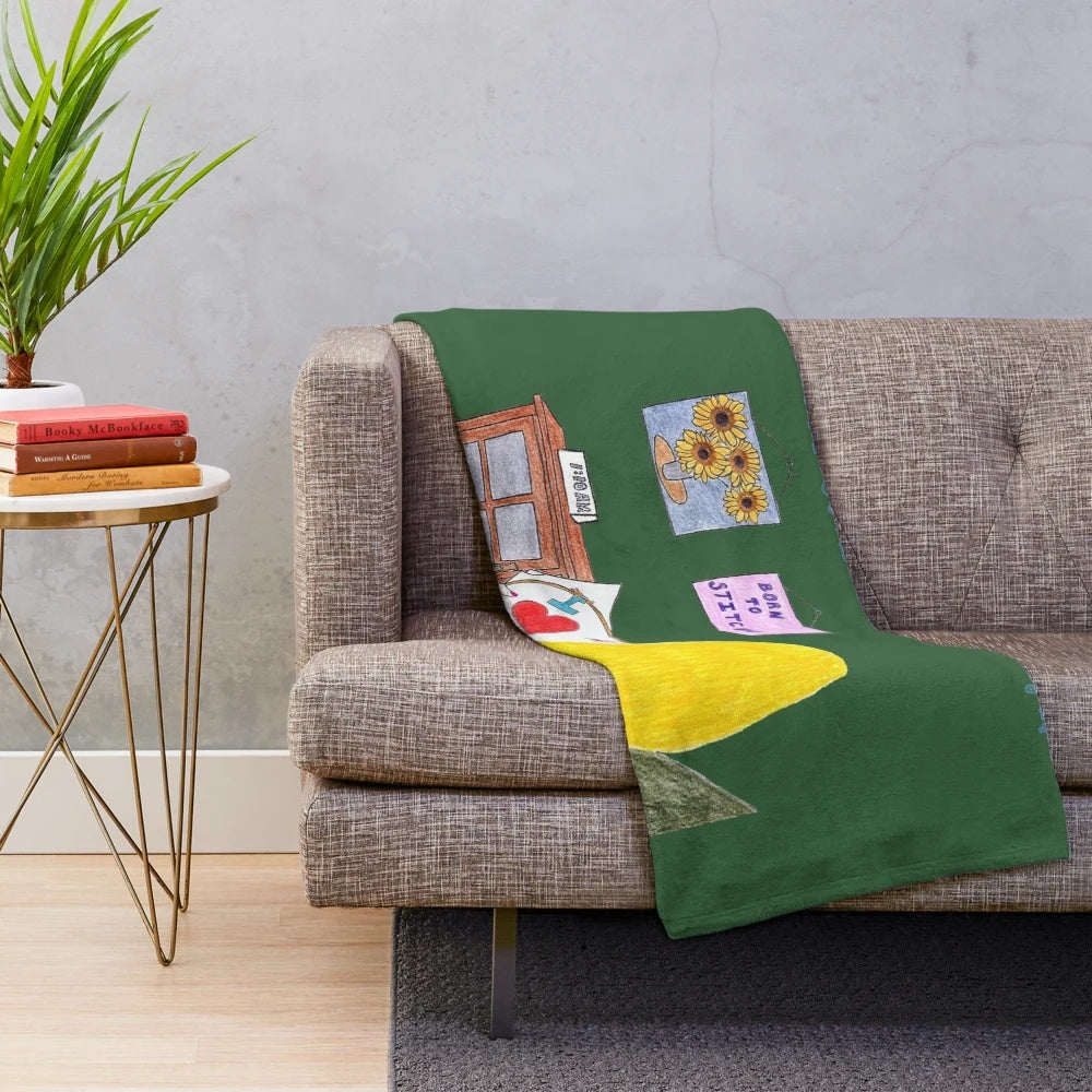 Sewing-themed plush blanket featuring a cozy design