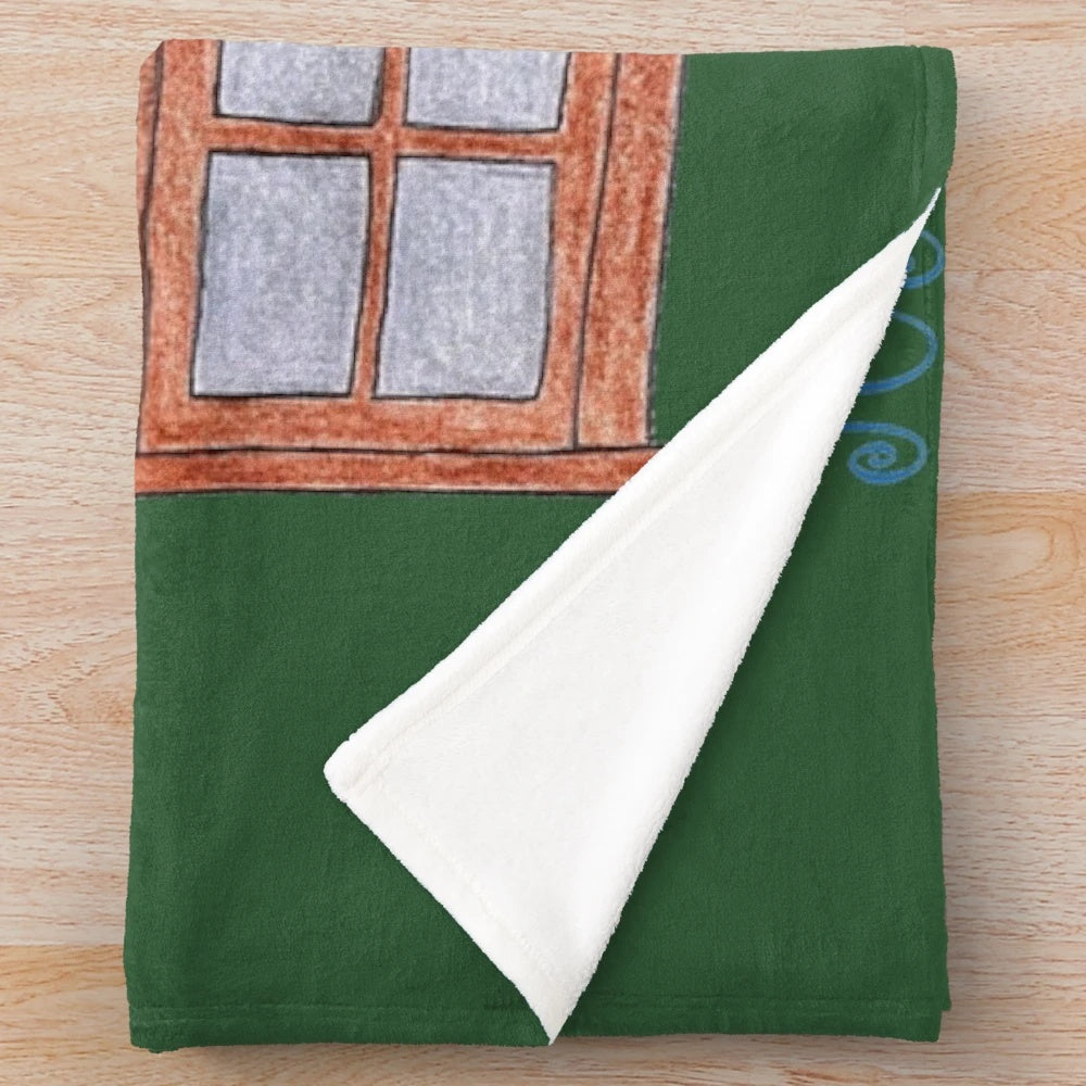Sewing-themed plush blanket featuring a cozy design