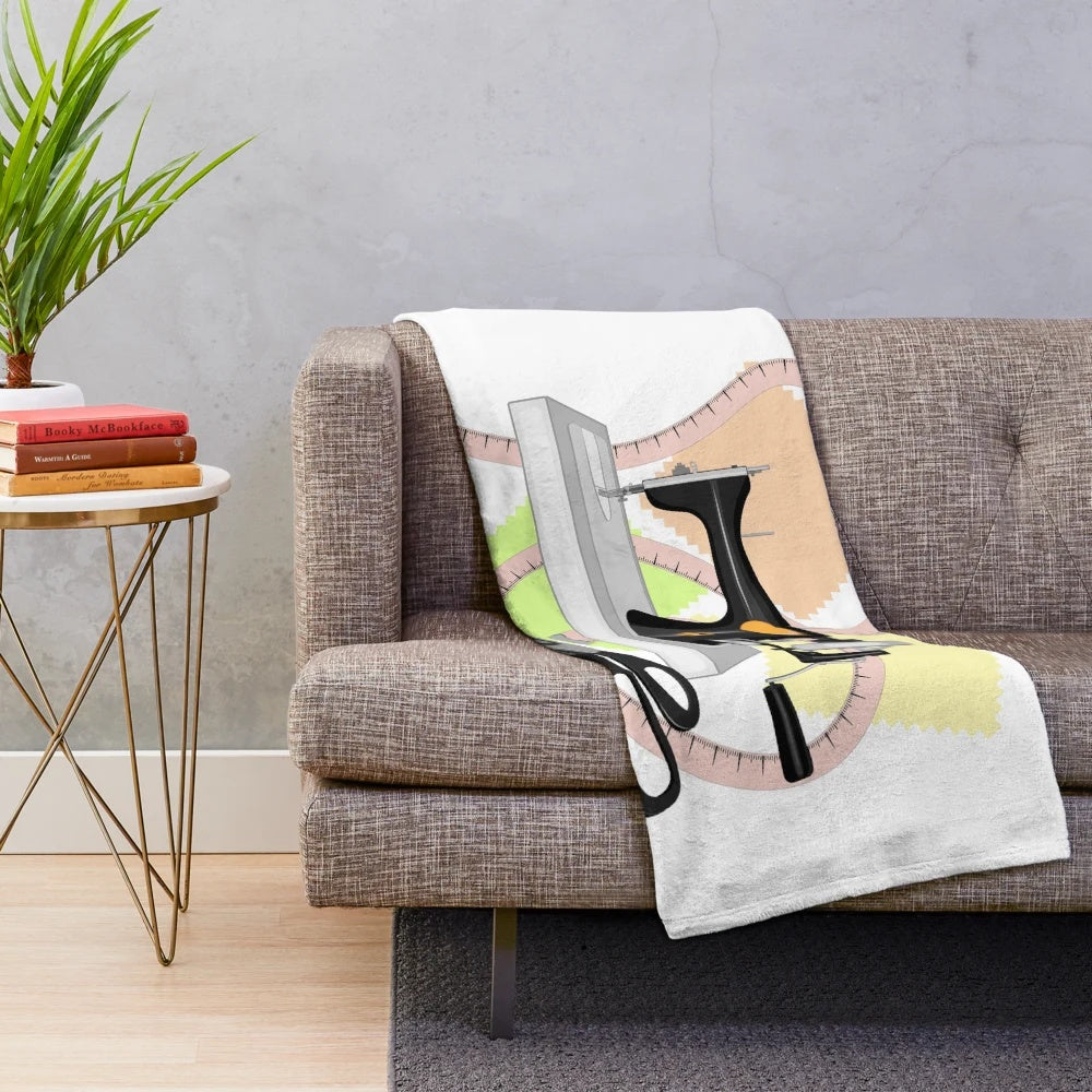 Plush blanket with sewing machine, scissors, and shreds design
