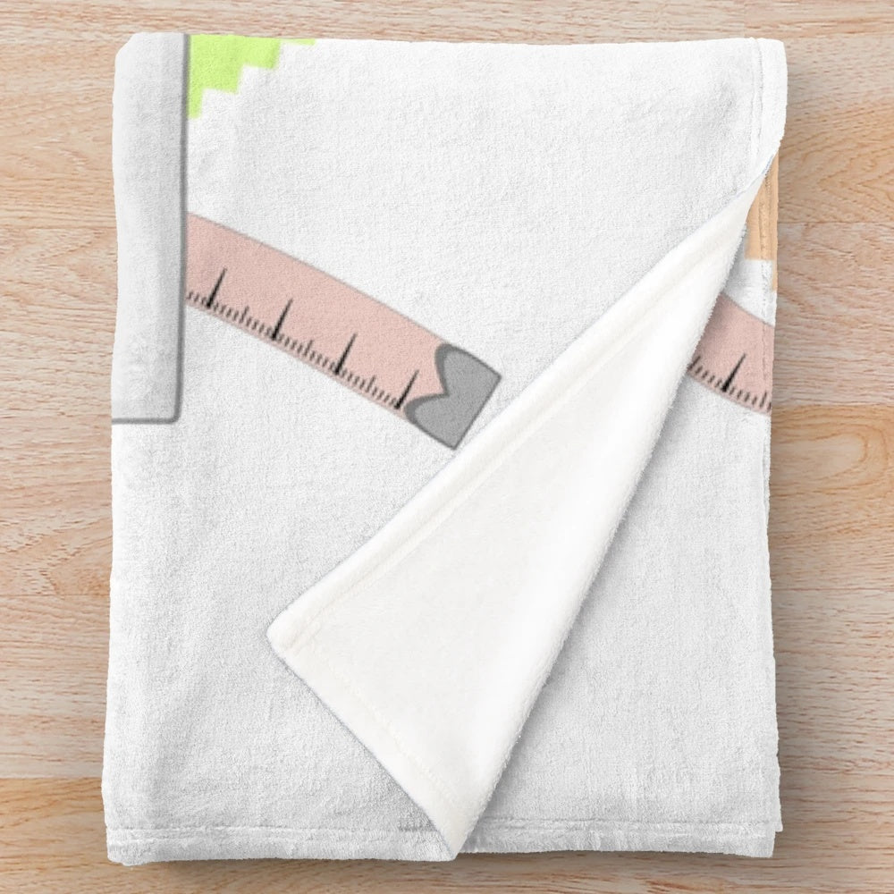 Plush blanket with sewing machine, scissors, and shreds design