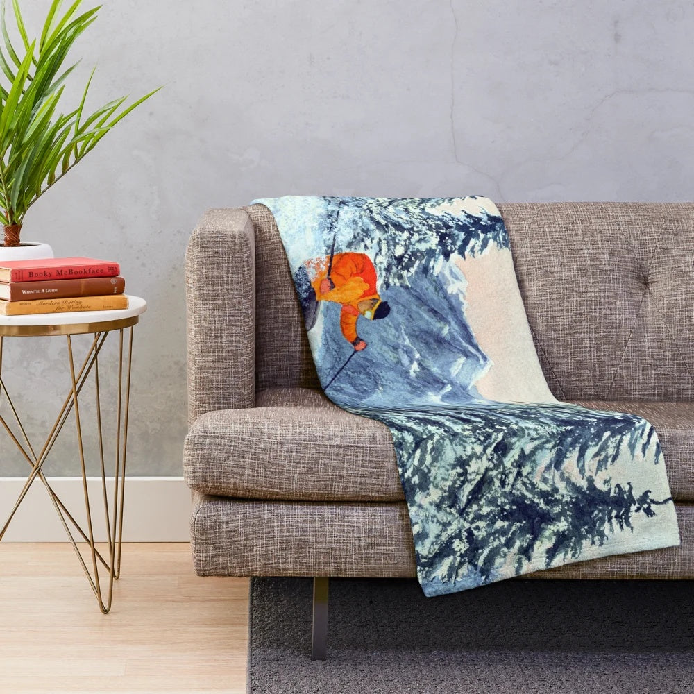 Plush blanket with "Live to Ski to Live" design