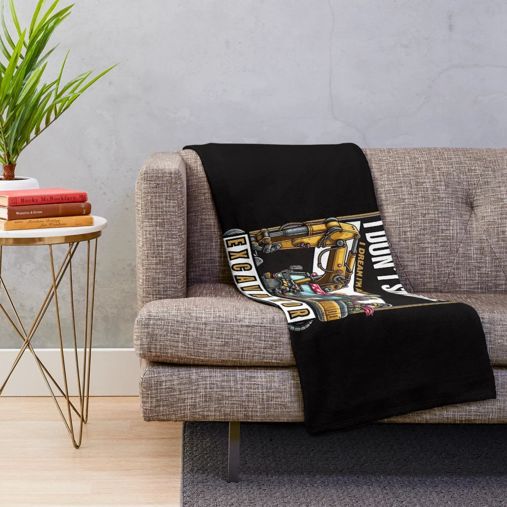 Plush blanket for snoring and monster truck enthusiasts