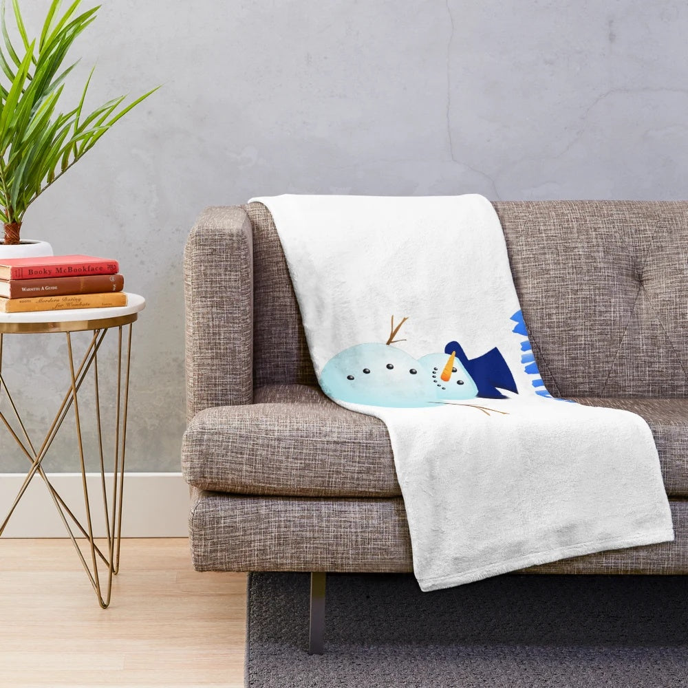 Stylized snow-themed plush blanket featuring triangular patterns and winter imagery
