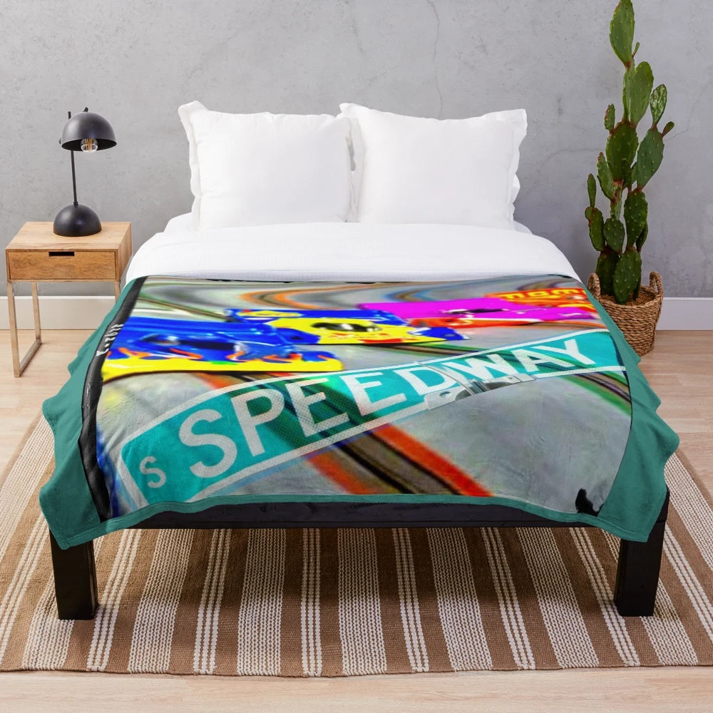 Plush blanket featuring speedway slot cars design