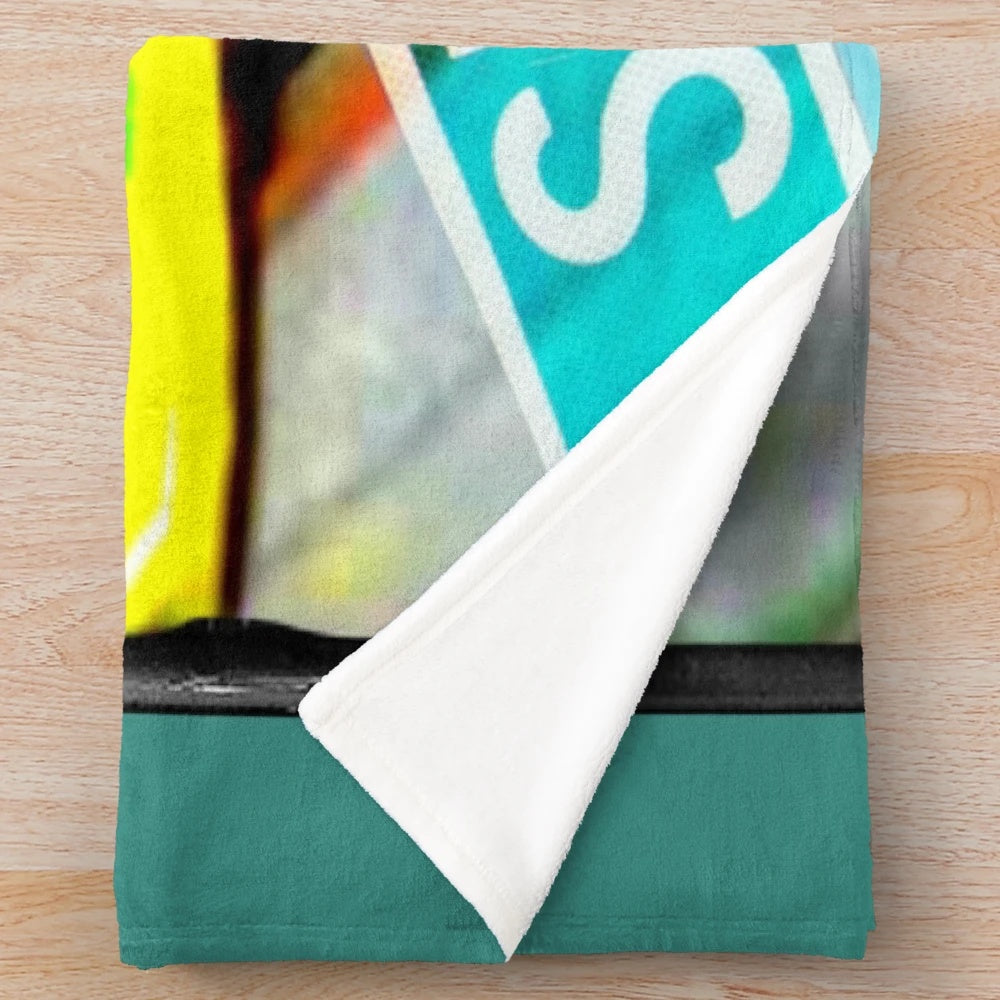 Plush blanket featuring speedway slot cars design
