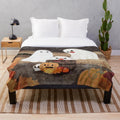 Plush blanket with ghostly apple bobbing design