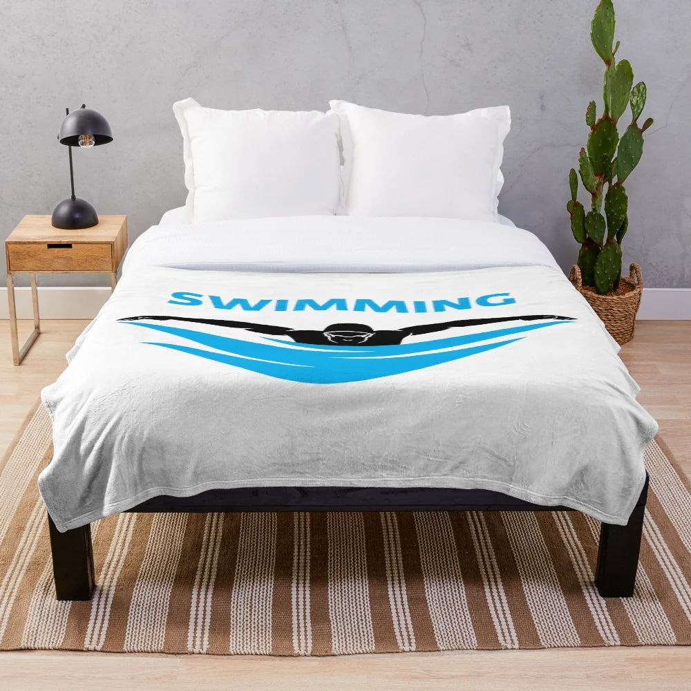 Soft and cuddly plush blanket perfect for swimming enthusiasts