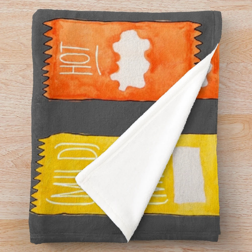 Soft and cozy plush blanket with spicy taco-inspired design