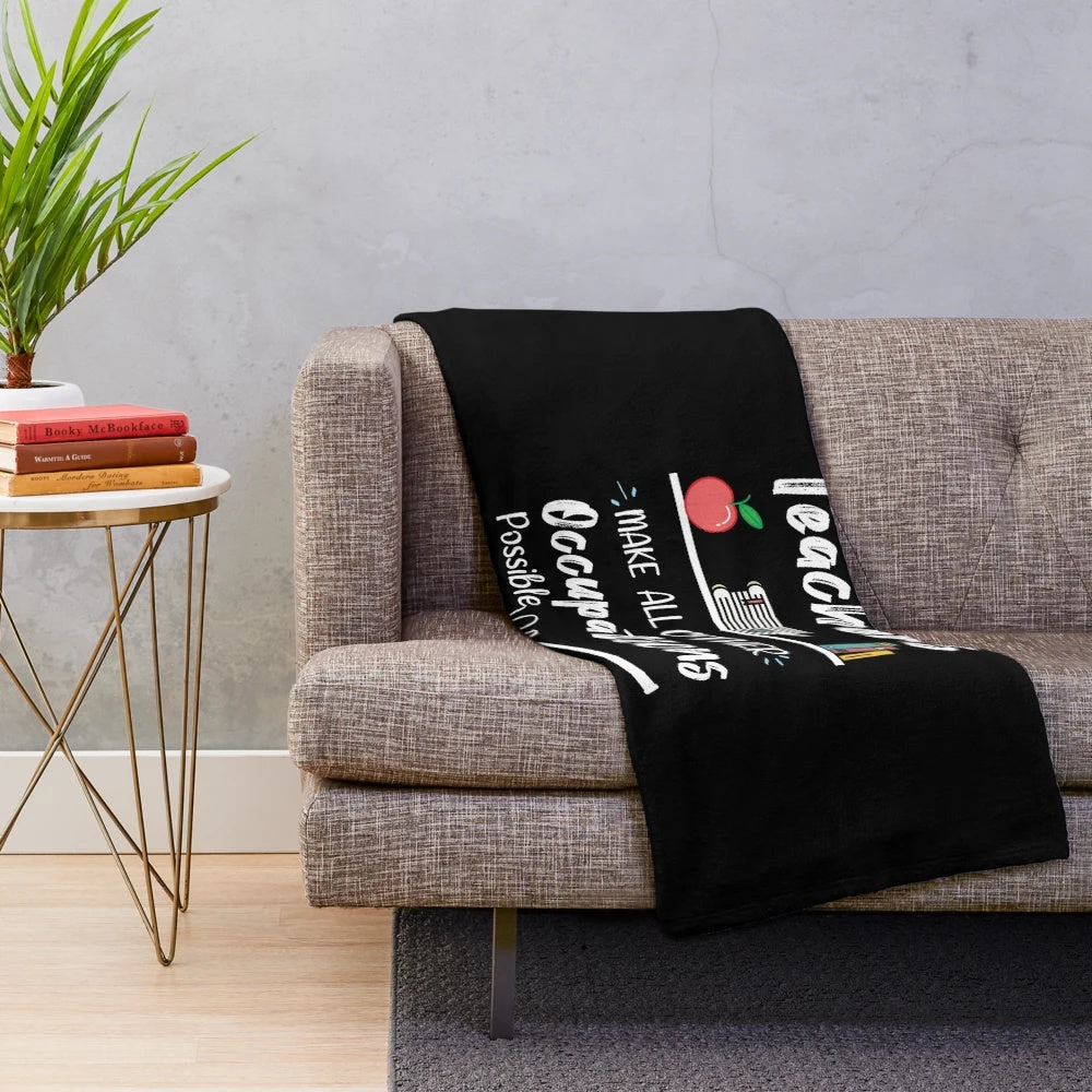 Plush blanket with text "Teachers Make All Other Occupations Possible