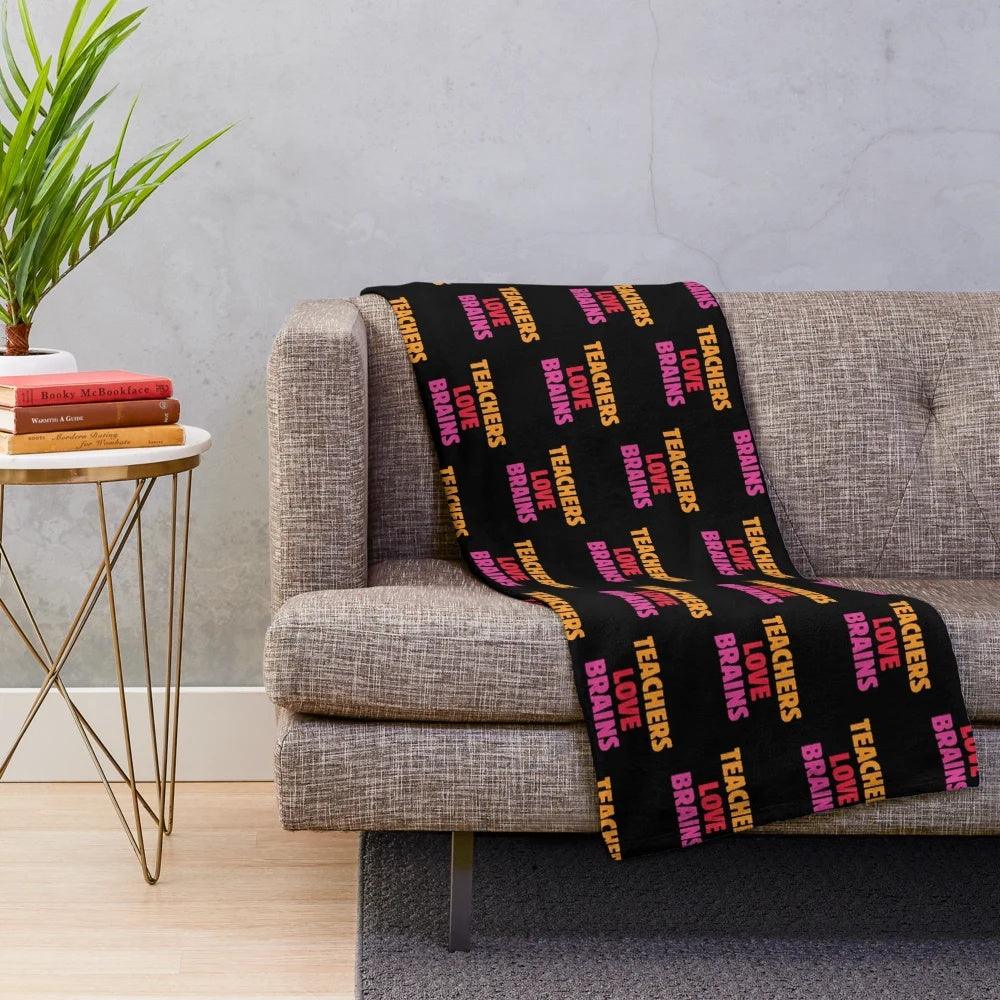 Plush blanket with a "Teachers Love Brains" design, perfect for teacher appreciation
