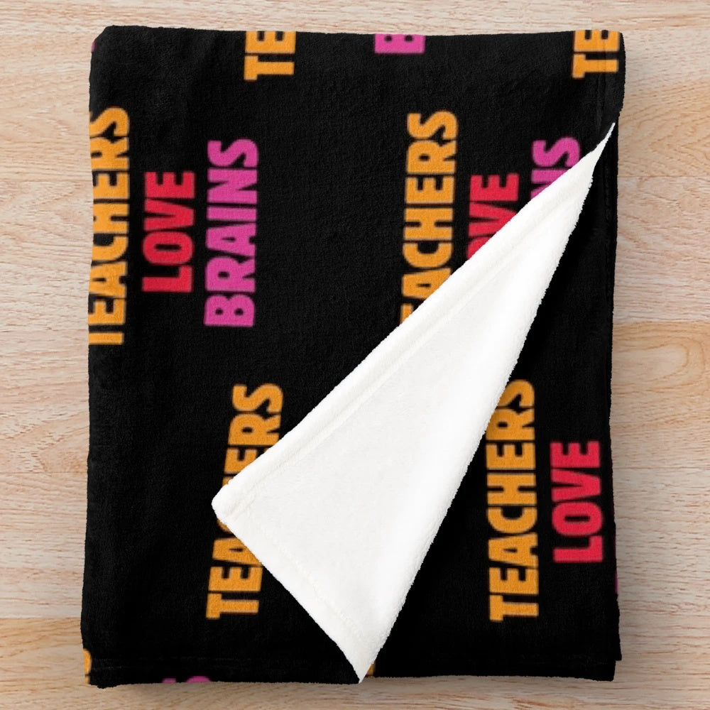 Plush blanket with a "Teachers Love Brains" design, perfect for teacher appreciation