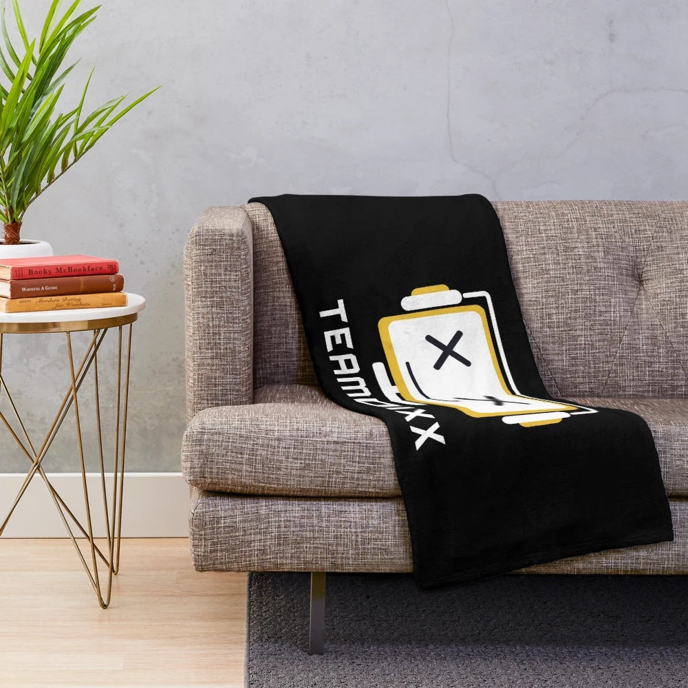 Soft and cozy plush blanket with TEAMDIXX white logo design, perfect for video game streaming and content creation